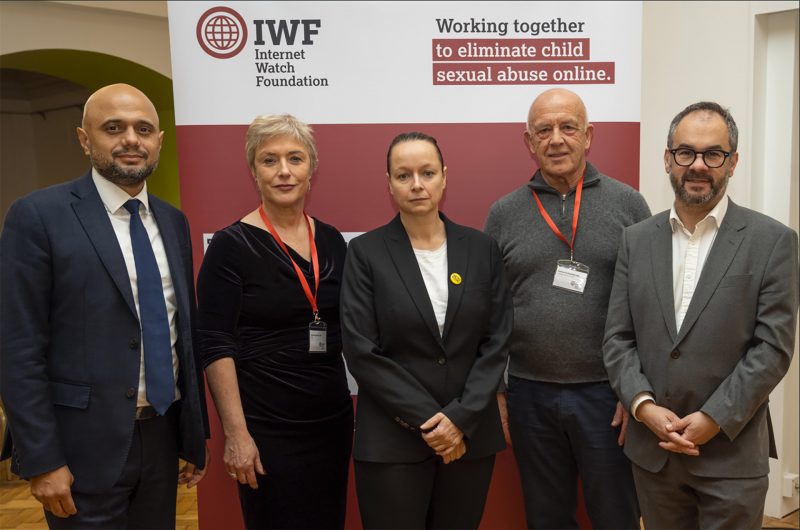 A group photo of attendees at IWF Westminster event, showing, from left, MP Sajid David, Susie Hargreaves OBE, Actor Samantha Morton, Andrew Puddephatt OBE and MP Paul Scully.)